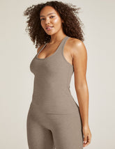 beige tank top.